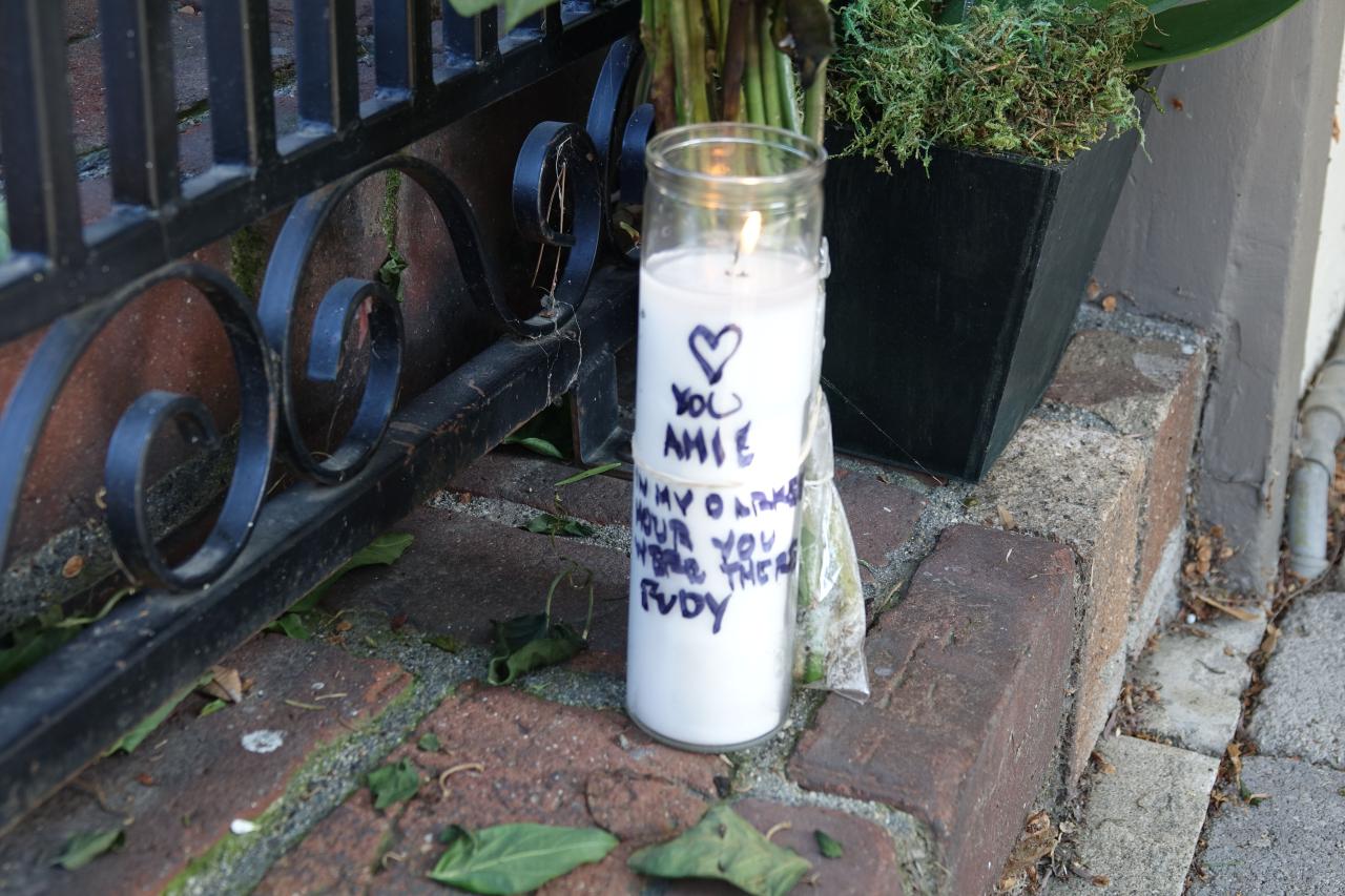 A candle for Harwick outside the house in LA